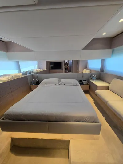 Ferretti Yachts 500 Yacht Photos Pics Luxurious bedroom interior of 2022 Ferretti Yachts 500, featuring modern design and elegant furnishings.