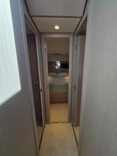Ferretti Yachts 500 Yacht Photos Pics Interior hallway of 2022 Ferretti Yachts 500, featuring modern design and lighting.