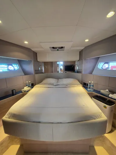 Ferretti Yachts 500 Yacht Photos Pics Luxurious bedroom interior of 2022 Ferretti Yachts 500, featuring modern design and ambient lighting.