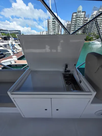 Ferretti Yachts 500 Yacht Photos Pics 2022 Ferretti Yachts 500 outdoor kitchenette with marina view.