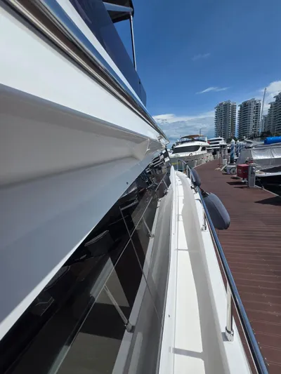 Ferretti Yachts 500 Yacht Photos Pics 2022 Ferretti Yachts 500 docked, showcasing sleek design and modern architecture.