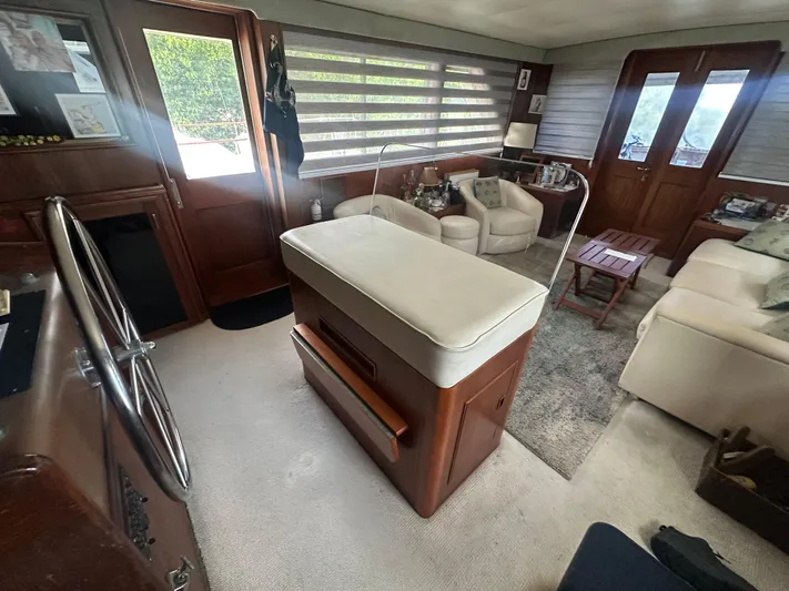  Yacht Photos Pics Interior of 1980 Hatteras 53 Motoryacht with elegant seating and wooden accents.