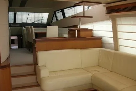  Yacht Photos Pics Luxurious interior of 2009 Ferretti Yachts 681 with elegant seating and modern design.