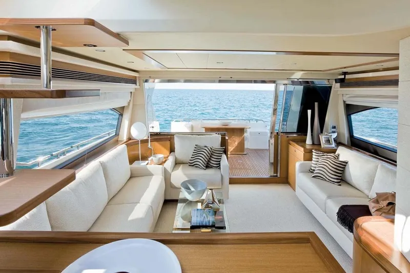  Yacht Photos Pics Luxurious interior of 2009 Ferretti Yachts 681 with ocean view and elegant furnishings.