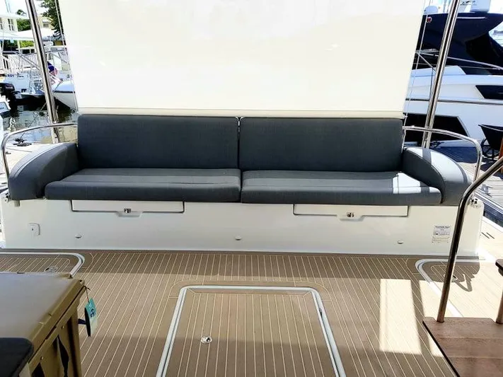 Calypso Yacht Photos Pics 2021 Fountaine Pajot MY6 yacht with sleek seating on deck.