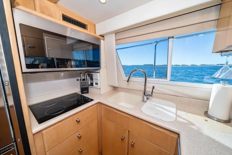 Cape San Blas Inn Yacht Photos Pics Modern kitchen in 1998 Carver 455 Aft Cabin Motor Yacht with ocean view.