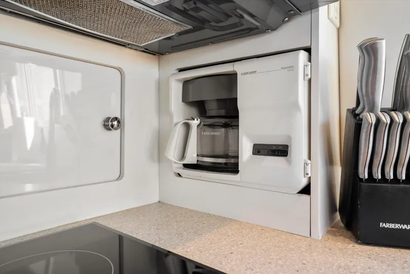 Cape San Blas Inn Yacht Photos Pics Built-in coffee maker and knife set in 1998 Carver 455 Aft Cabin Motor Yacht kitchen.