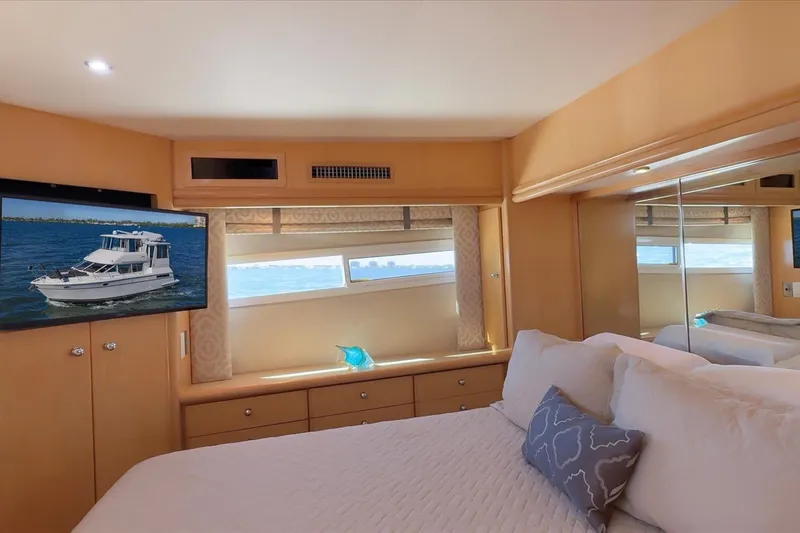 Cape San Blas Inn Yacht Photos Pics Luxurious bedroom interior of 1998 Carver 455 Aft Cabin Motor Yacht with ocean view.