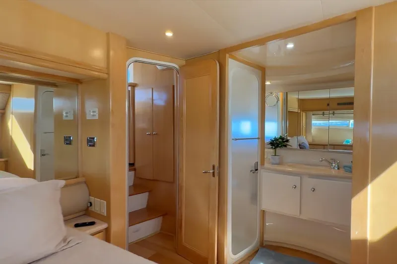 Cape San Blas Inn Yacht Photos Pics Luxurious interior of 1998 Carver 455 Aft Cabin Motor Yacht with elegant wood finishes.