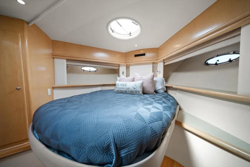 Cape San Blas Inn Yacht Photos Pics Luxurious cabin interior of 1998 Carver 455 Aft Cabin Motor Yacht with cozy bedding.