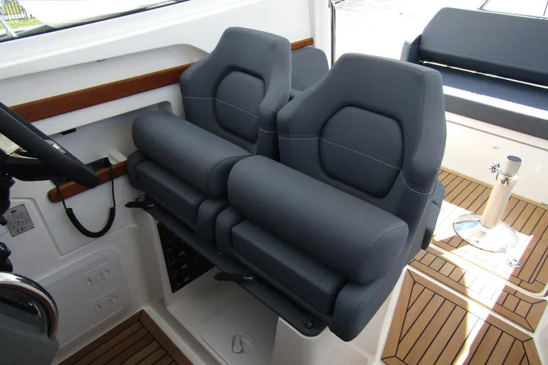  Yacht Photos Pics Luxury seating in 2025 Nimbus Weekender 9 boat, featuring sleek design and premium materials.