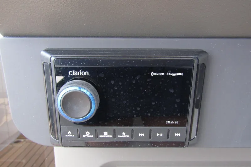  Yacht Photos Pics Clarion audio system in 2025 Nimbus Weekender 9, featuring Bluetooth and SiriusXM connectivity.