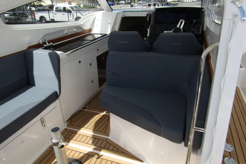  Yacht Photos Pics Interior of 2025 Nimbus Weekender 9 boat with modern seating and sleek design.