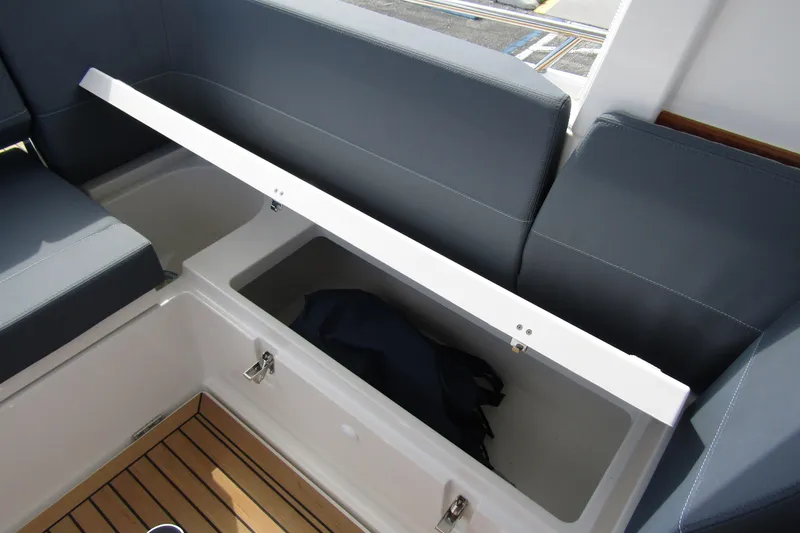  Yacht Photos Pics Nimbus Weekender 9 (2025) boat storage compartment with open seat and visible interior.