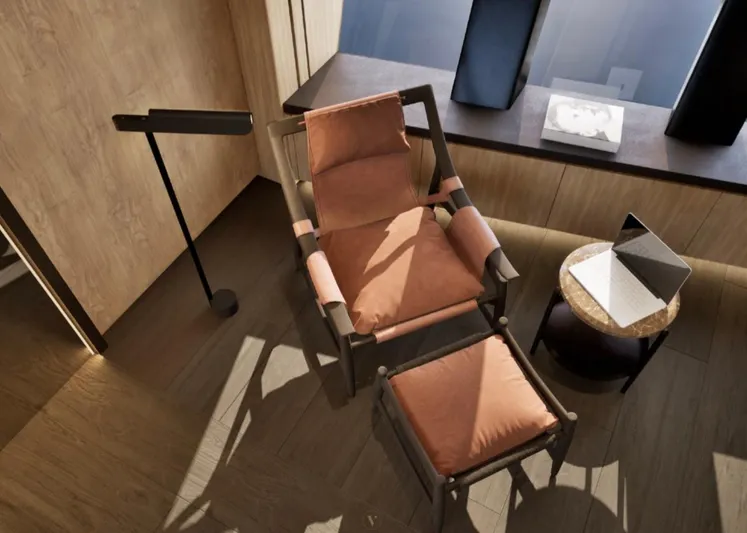 Project Ice Yacht Photos Pics Luxurious seating area on 2026 custom motor yacht with modern chair and ottoman.