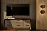 Luxurious motor yacht interior with modern TV, elegant dresser, and ambient lighting, 2026 design.