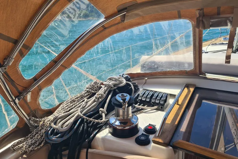  Yacht Photos Pics Interior view of 2009 Jeanneau Sun Odyssey 50 DS sailboat with ropes and winch.