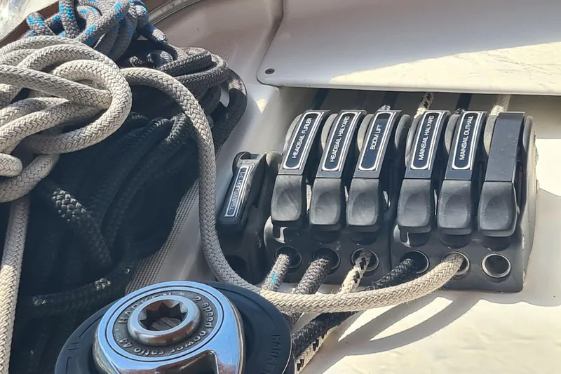  Yacht Photos Pics Close-up of sailing ropes and clutches on a 2009 Jeanneau Sun Odyssey 50 DS yacht.