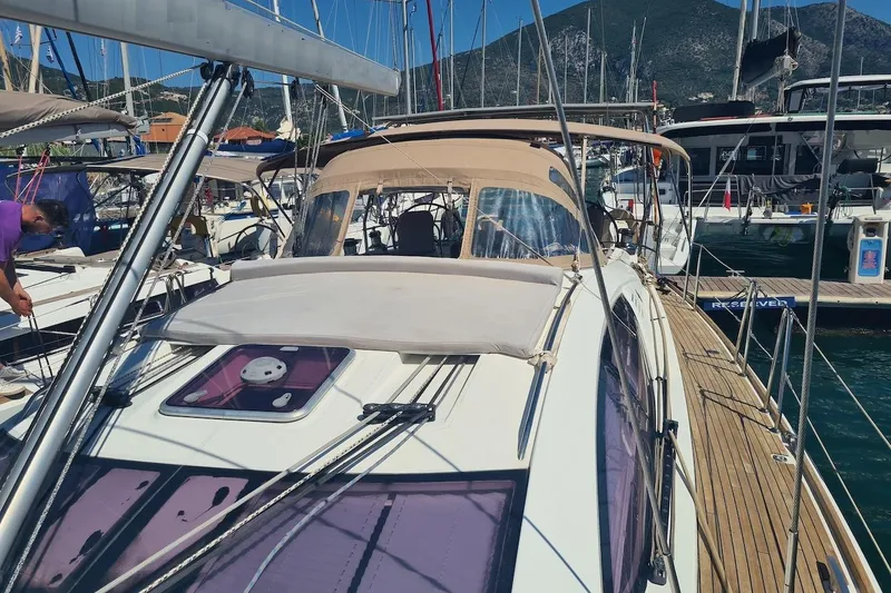  Yacht Photos Pics 2009 Jeanneau Sun Odyssey 50 DS yacht docked in marina, featuring sleek design and spacious deck.