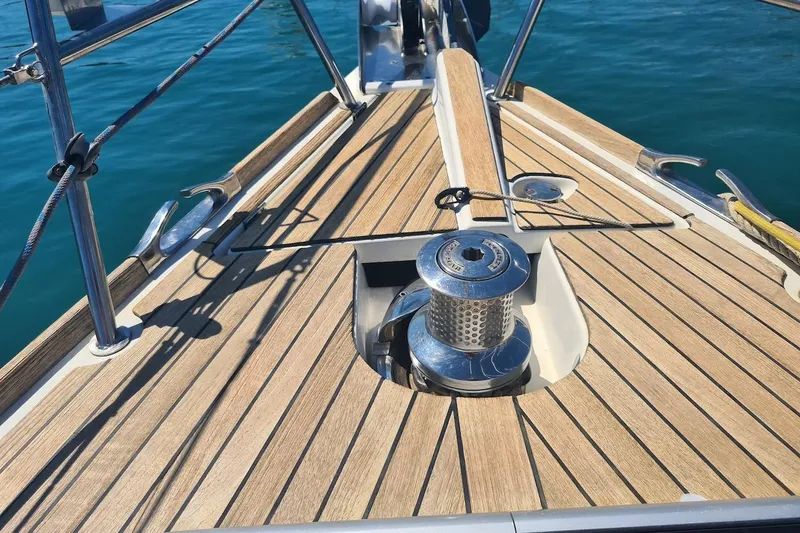  Yacht Photos Pics Deck of 2009 Jeanneau Sun Odyssey 50 DS yacht with winch and teak finish.