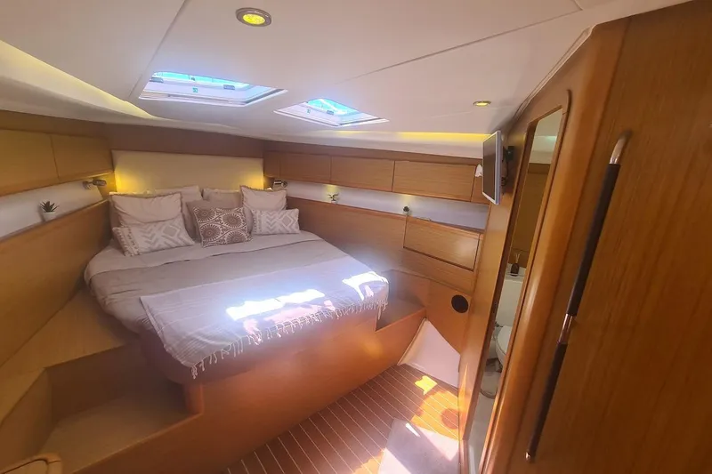  Yacht Photos Pics Luxurious cabin interior of 2009 Jeanneau Sun Odyssey 50 DS yacht.