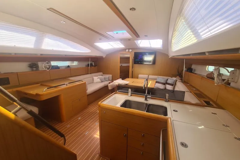  Yacht Photos Pics Luxurious interior of 2009 Jeanneau Sun Odyssey 50 DS yacht with modern amenities.