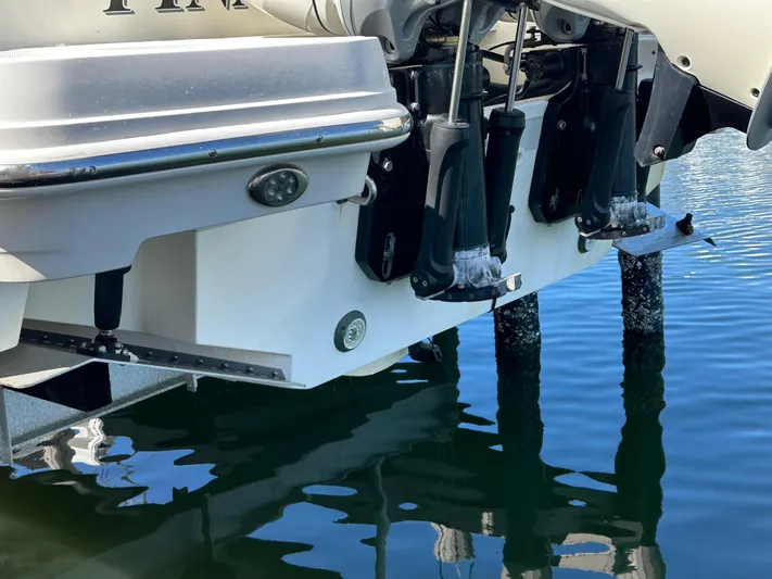  Yacht Photos Pics 2018 Boston Whaler 320 Vantage boat stern with dual outboard motors in water.