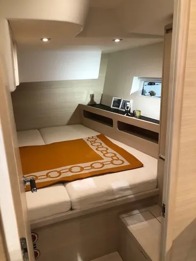 Sultans Of Swing Yacht Photos Pics Cozy cabin interior of 2020 Solaris 50 yacht with modern design and warm lighting.