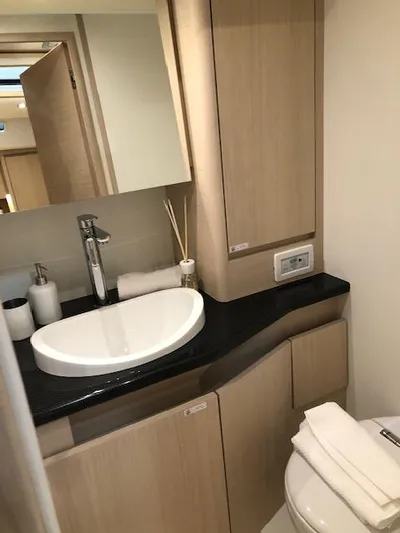 Sultans Of Swing Yacht Photos Pics Luxurious bathroom in 2020 Solaris 50 yacht with modern fixtures and elegant design.