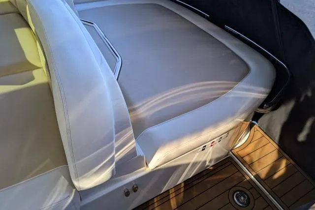 Nautalia Yacht Photos Pics 2013 Sea Ray 470 Sundancer interior with beige seating and wooden flooring.