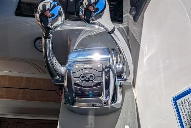 Nautalia Yacht Photos Pics Chrome throttle controls on a 2013 Sea Ray 470 Sundancer yacht.