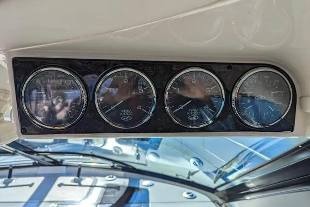 Nautalia Yacht Photos Pics Dashboard gauges on a 2013 Sea Ray 470 Sundancer boat, showing RPM indicators.