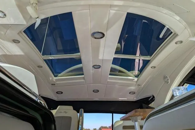 Nautalia Yacht Photos Pics Interior view of 2013 Sea Ray 470 Sundancer with panoramic sunroof and modern design.