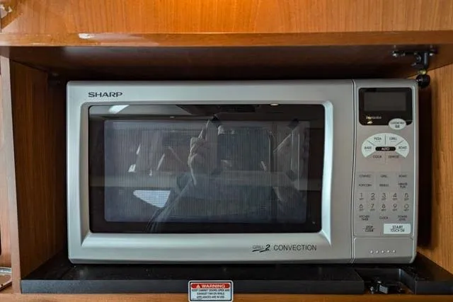 Nautalia Yacht Photos Pics Sharp convection microwave in 2013 Sea Ray 470 Sundancer yacht kitchen.