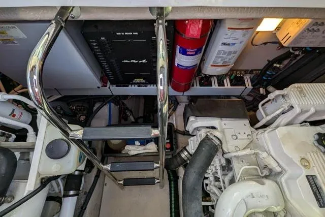 Nautalia Yacht Photos Pics Engine room of 2013 Sea Ray 470 Sundancer with equipment and safety features.