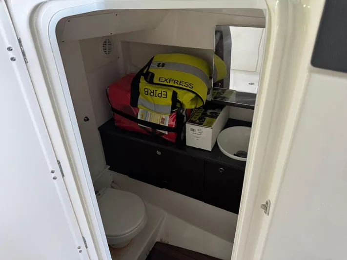  Yacht Photos Pics Interior of 2019 Everglades 340 Dual Console boat with storage and sink.