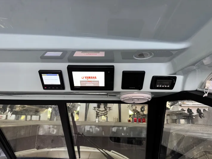  Yacht Photos Pics Interior dashboard of 2019 Everglades 340 Dual Console boat with Yamaha display.