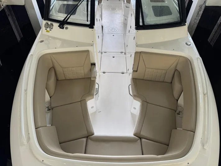 Yacht Photos Pics 2019 Everglades 340 Dual Console boat interior with beige seating and white deck.