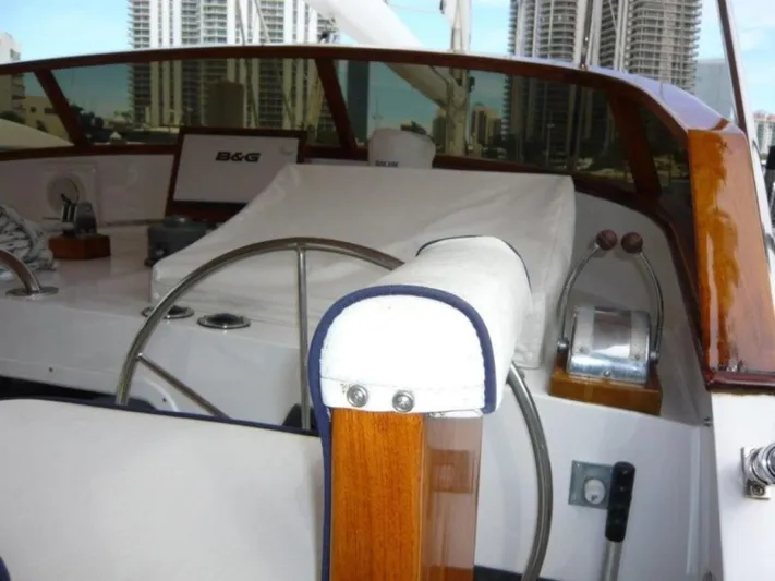 Maraya Yacht Photos Pics 1990 Cheoy Lee Sloop cockpit with steering wheel and navigation equipment.