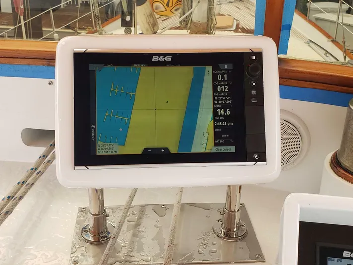 Maraya Yacht Photos Pics Navigation system on 1990 Cheoy Lee Sloop, displaying nautical charts and data.