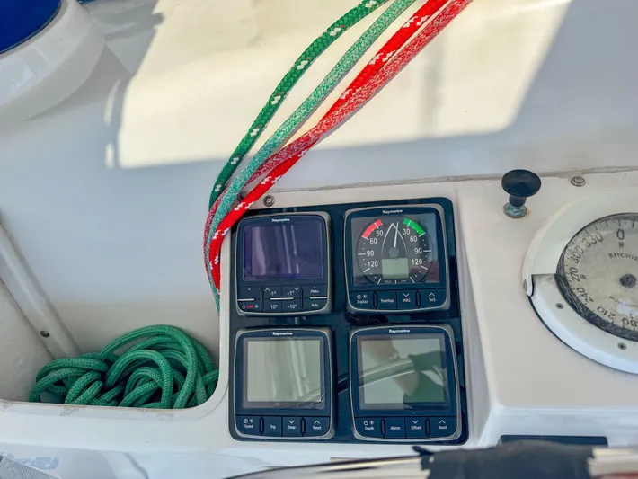 Kisa Yacht Photos Pics Control panel of a 2000 Manta 42 sailboat with ropes and gauges.