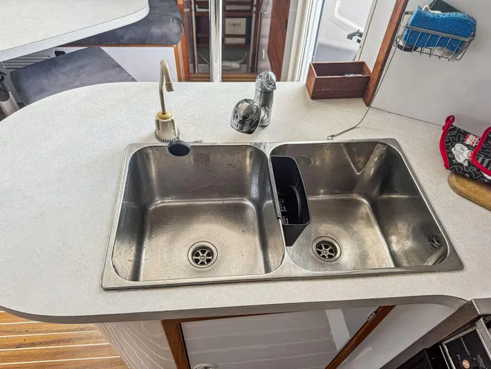 Kisa Yacht Photos Pics Double sink in a 2000 Manta 42 yacht kitchen with modern fixtures.