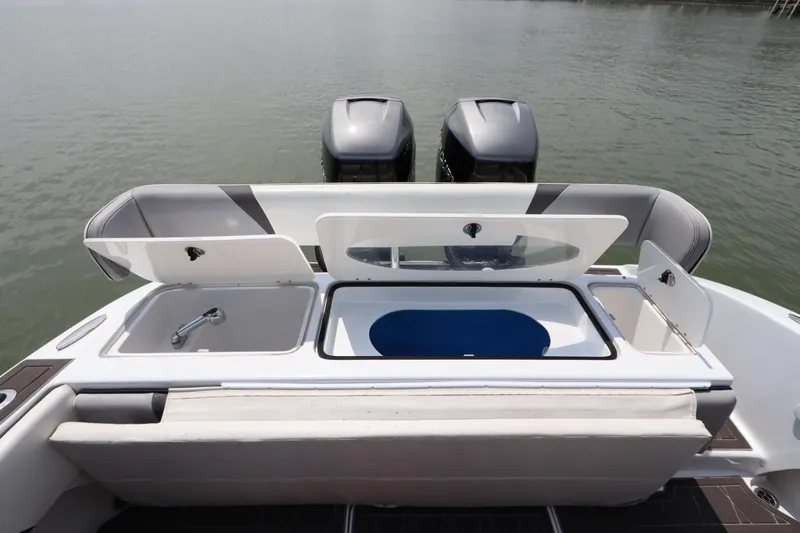  Yacht Photos Pics 2019 Statement 350 Open boat with dual outboard motors and open storage compartments.