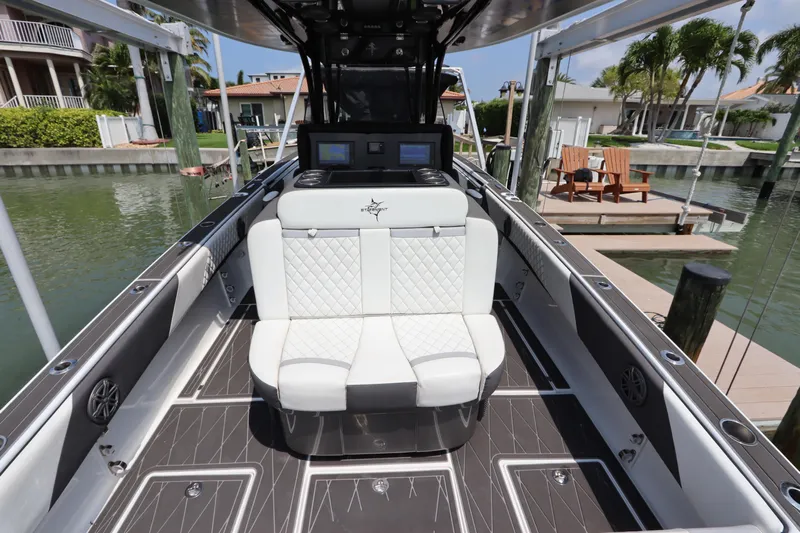  Yacht Photos Pics 2019 Statement 350 Open boat interior with white seating and modern dashboard.