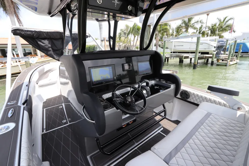  Yacht Photos Pics 2019 Statement 350 Open boat cockpit with advanced navigation systems and luxurious seating.