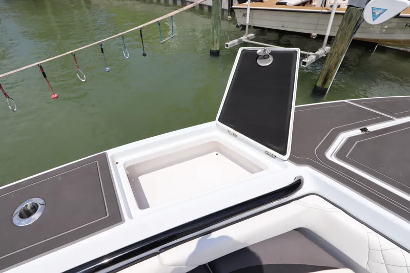  Yacht Photos Pics Open storage compartment on a 2019 Statement 350 Open boat docked by the water.
