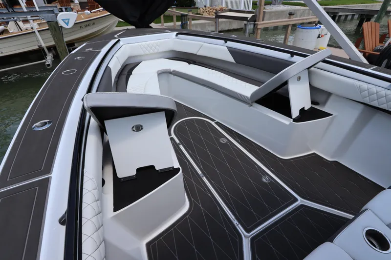  Yacht Photos Pics 2019 Statement 350 Open boat interior with seating and storage compartments.