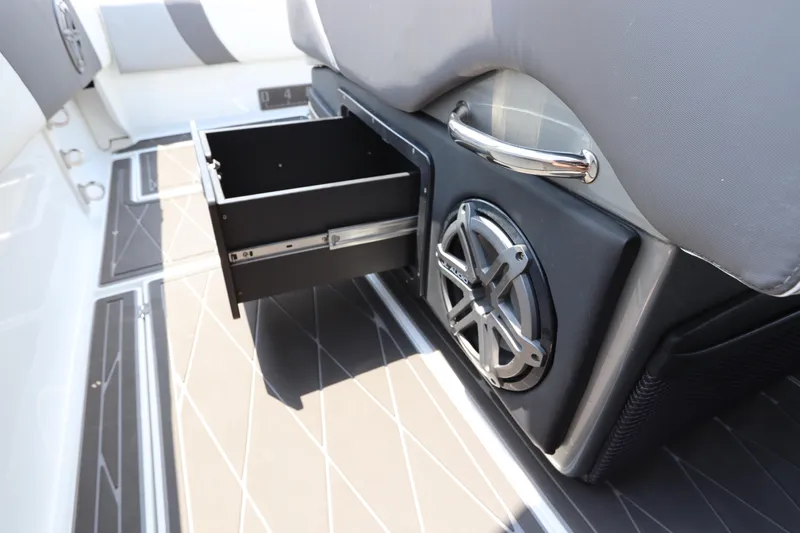  Yacht Photos Pics 2019 Statement 350 Open boat interior with open storage drawer and speaker.