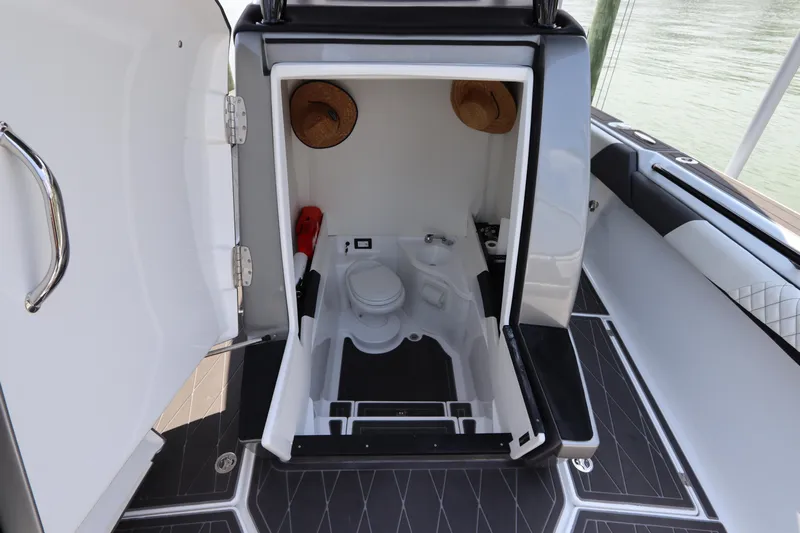  Yacht Photos Pics Interior view of 2019 Statement 350 Open boat's compact bathroom.