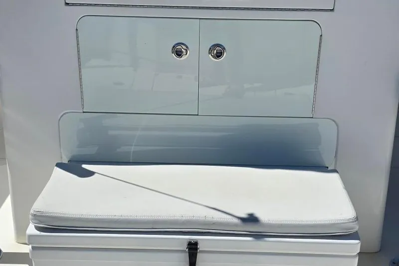 Hat Trick Yacht Photos Pics 2020 SeaVee 390Z boat seating area with storage compartments.